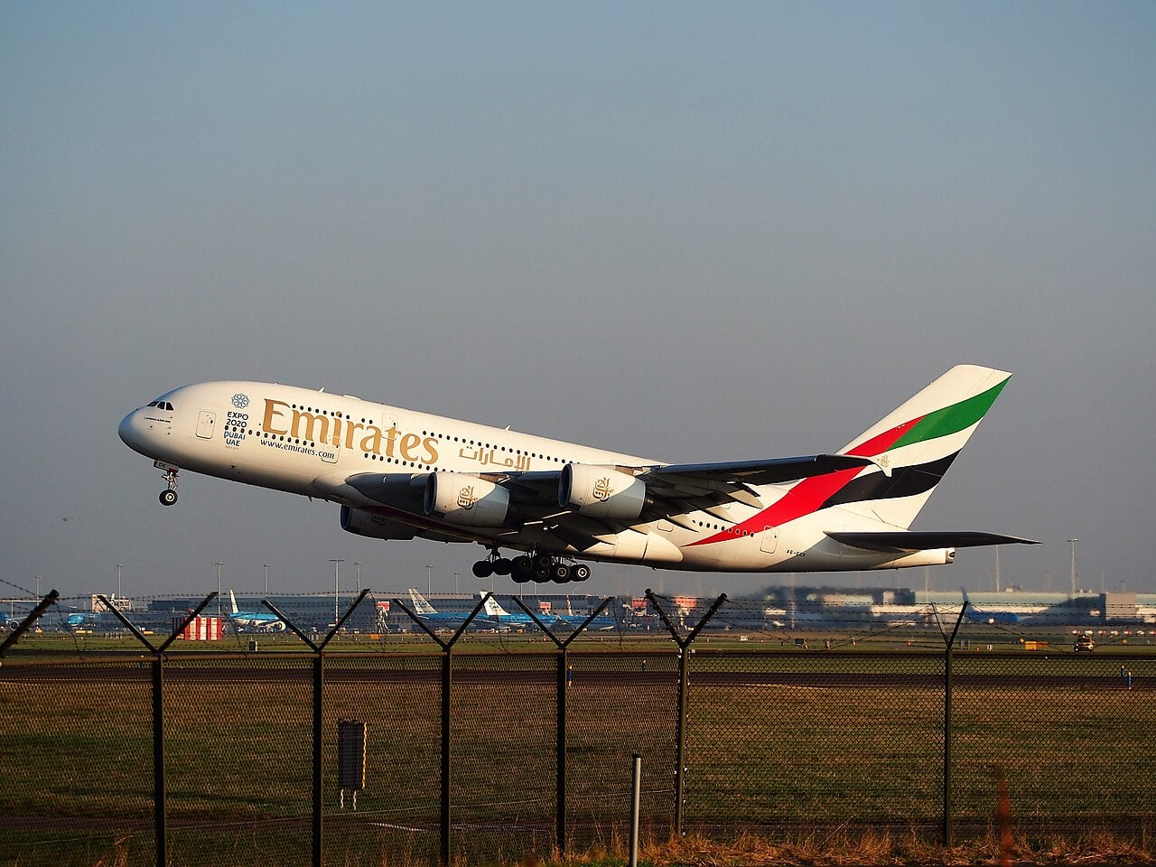 Emirates Airbus A380 A6-EDK taking off at Schiphol Emirates Airbus A380 A6-EDK lifting off from Amsterdam Schiphol with four engines