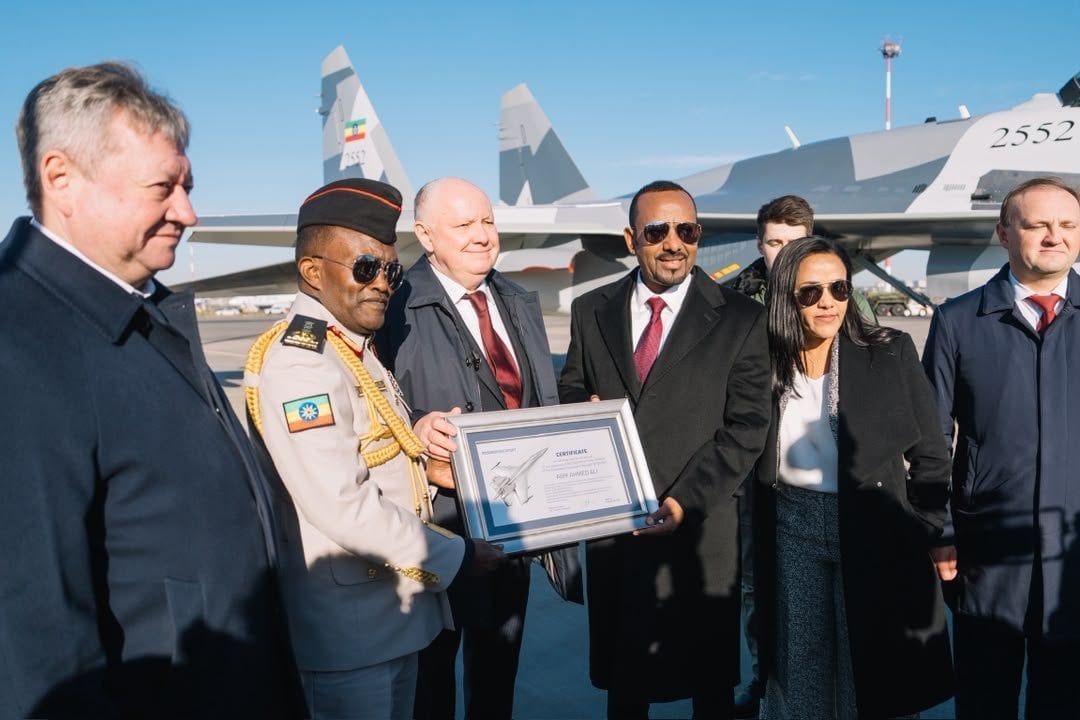 Abiy Ahmed and Russian officials at the handover of Ethiopia's first Su-35 fighters