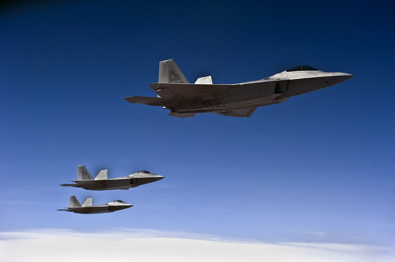 Three F-22 Raptors of the 27th Fighter Squadron during Red Flag 13-3 at Nellis