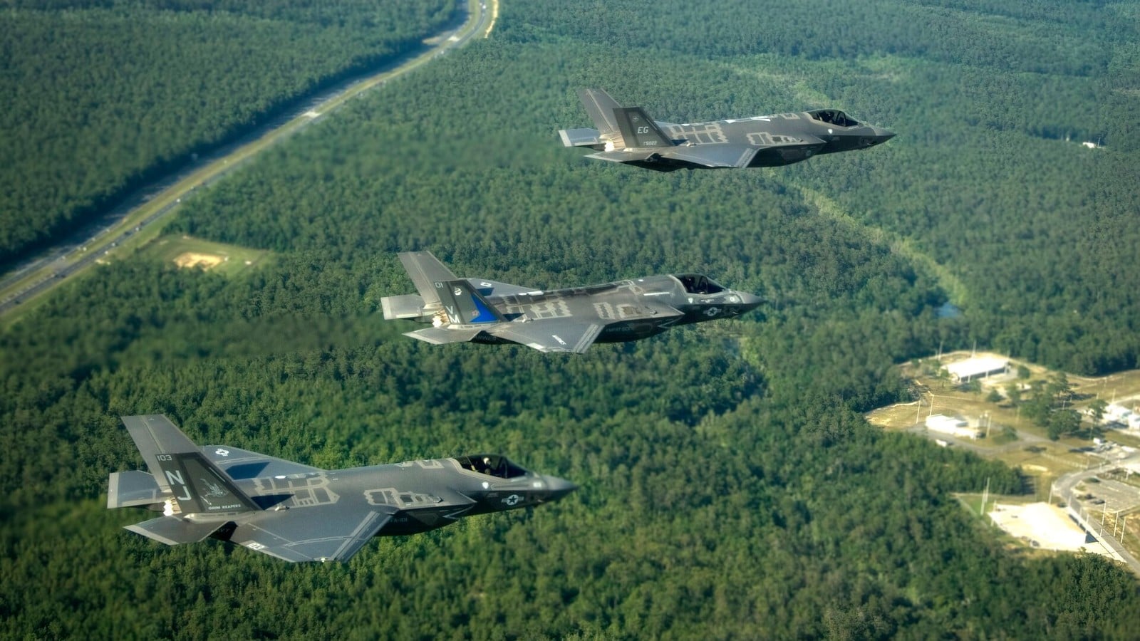 850 F-35s Over Ten Years: Pentagon and Lockheed Sign Multiyear Framework F-35A, F-35B and F-35C Lightning II fighters flying in formation near Eglin Air Force Base