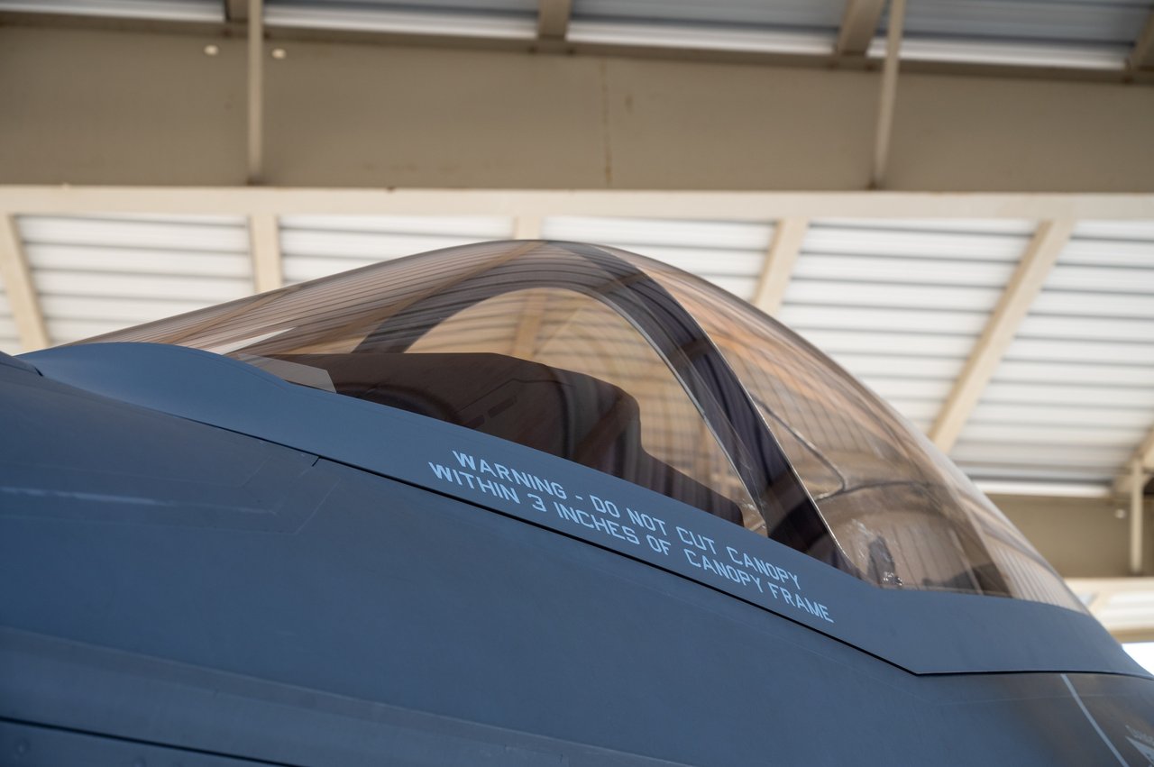 Close-up of the tinted one-piece canopy and integrated bow frame of a US Air Force F-35A at Hill Air Force Base, Utah