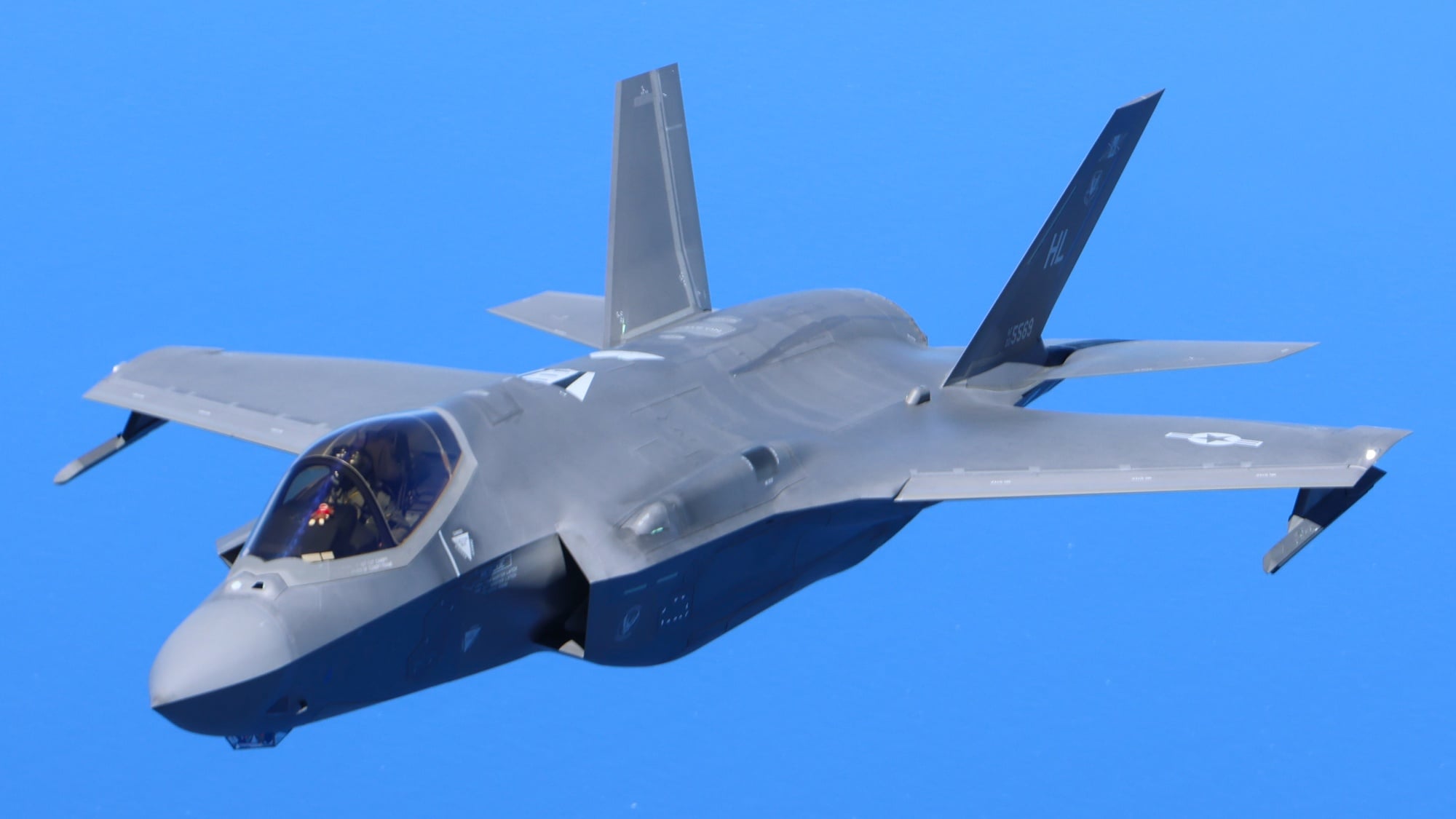 A US Air Force F-35A Lightning II photographed from the boom pod of a KC-135 Stratotanker