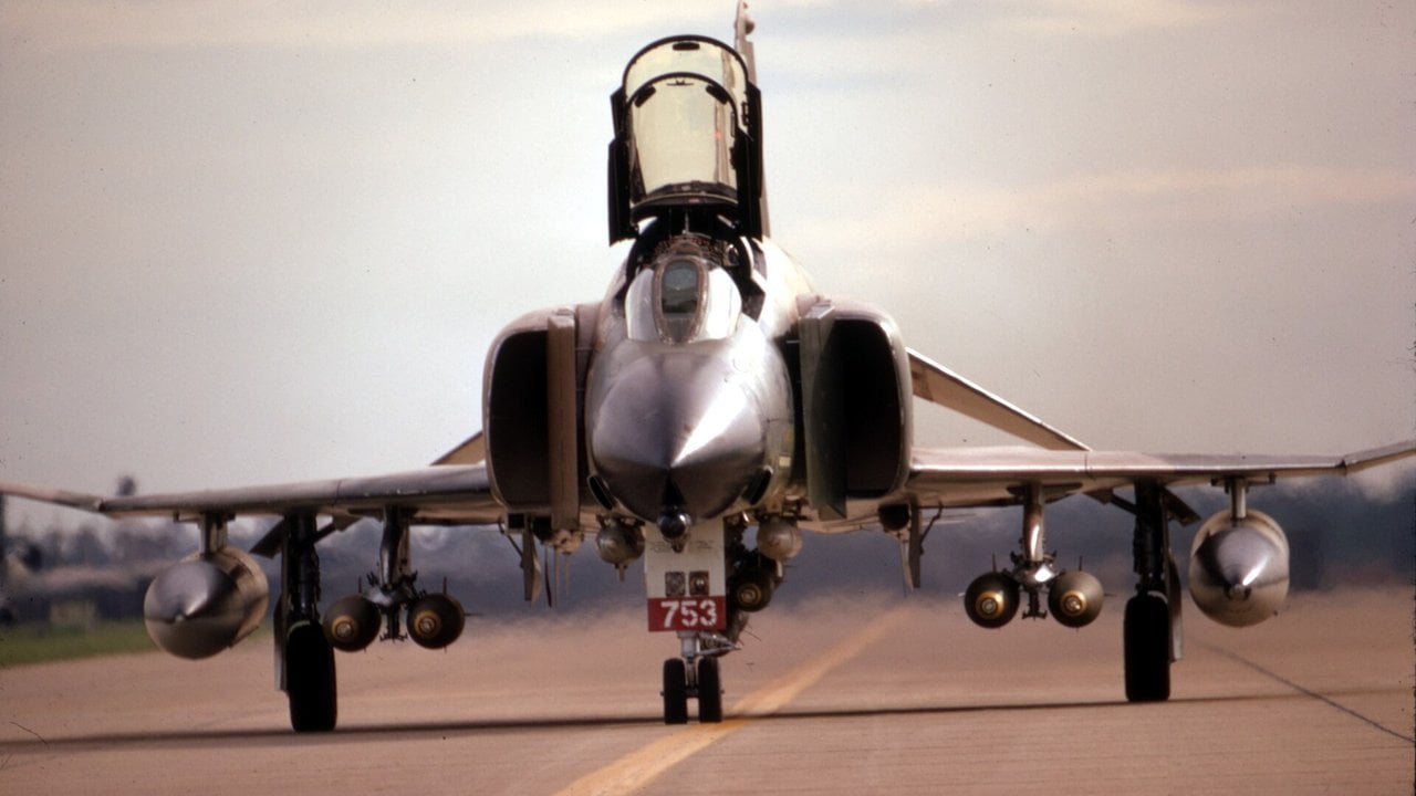 Front view of an 8th Tactical Fighter Wing F-4E Phantom II taxiing at Ubon, Thailand, with the M61 gun fairing under the nose