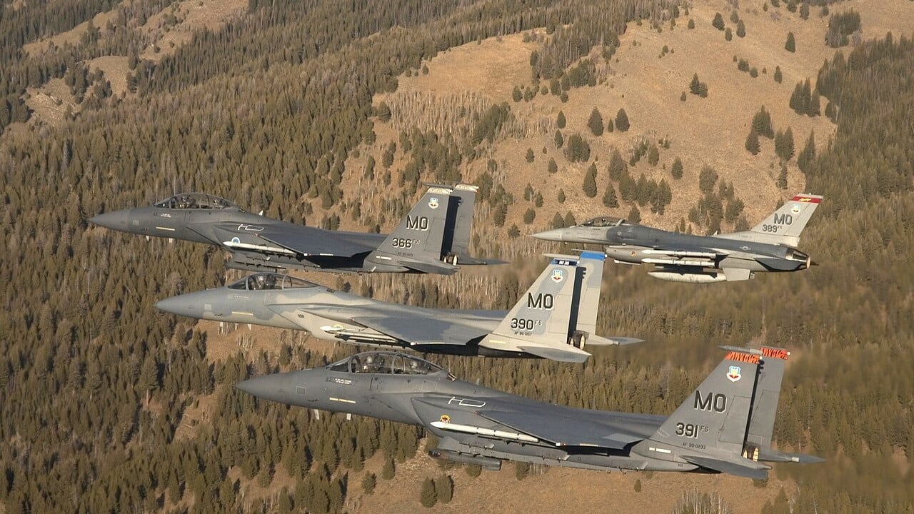 A four-ship formation of F-15 and F-16 fighters from the 366th Fighter Wing over Idaho