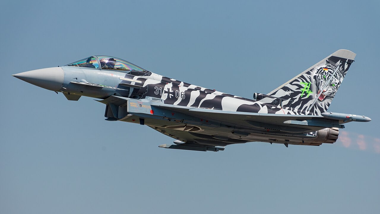 German Air Force Eurofighter Typhoon EF2000 serial 31 plus 06 in tiger markings, climbing away