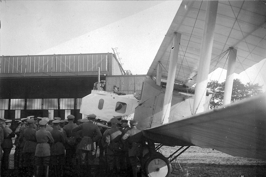 Crowd of German officers around a Kagohl 3 Gotha G.IV bomber at St Denis-Westrem airfield in Belgium, 1917
