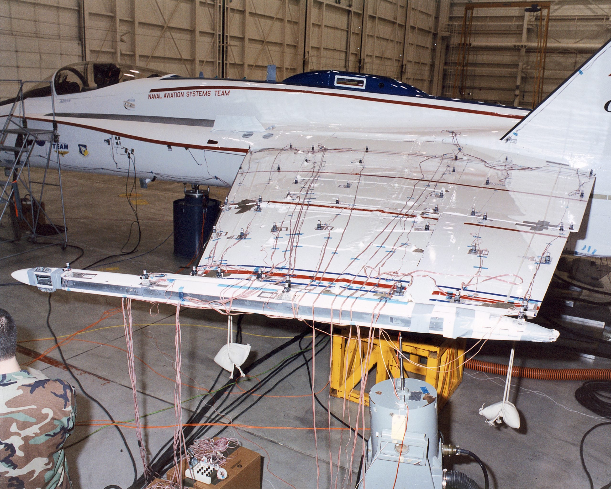 Accelerometers and wiring covering an F/A-18 wing during a ground vibration test