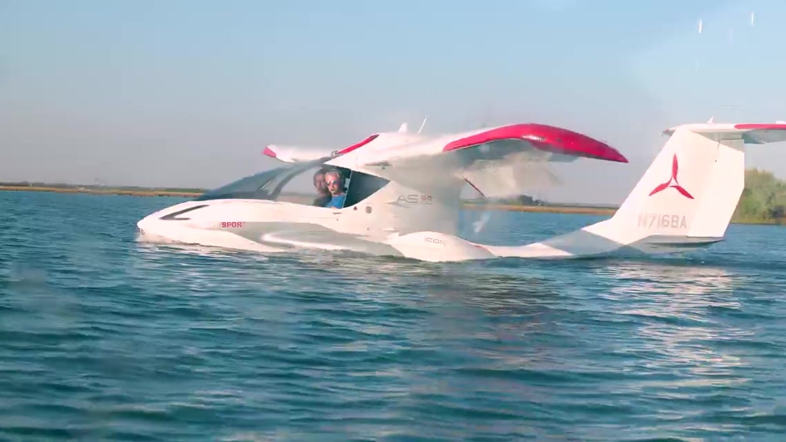Icon A5 amphibian taxiing on the water with its canopy open during USAF Test Pilot School training