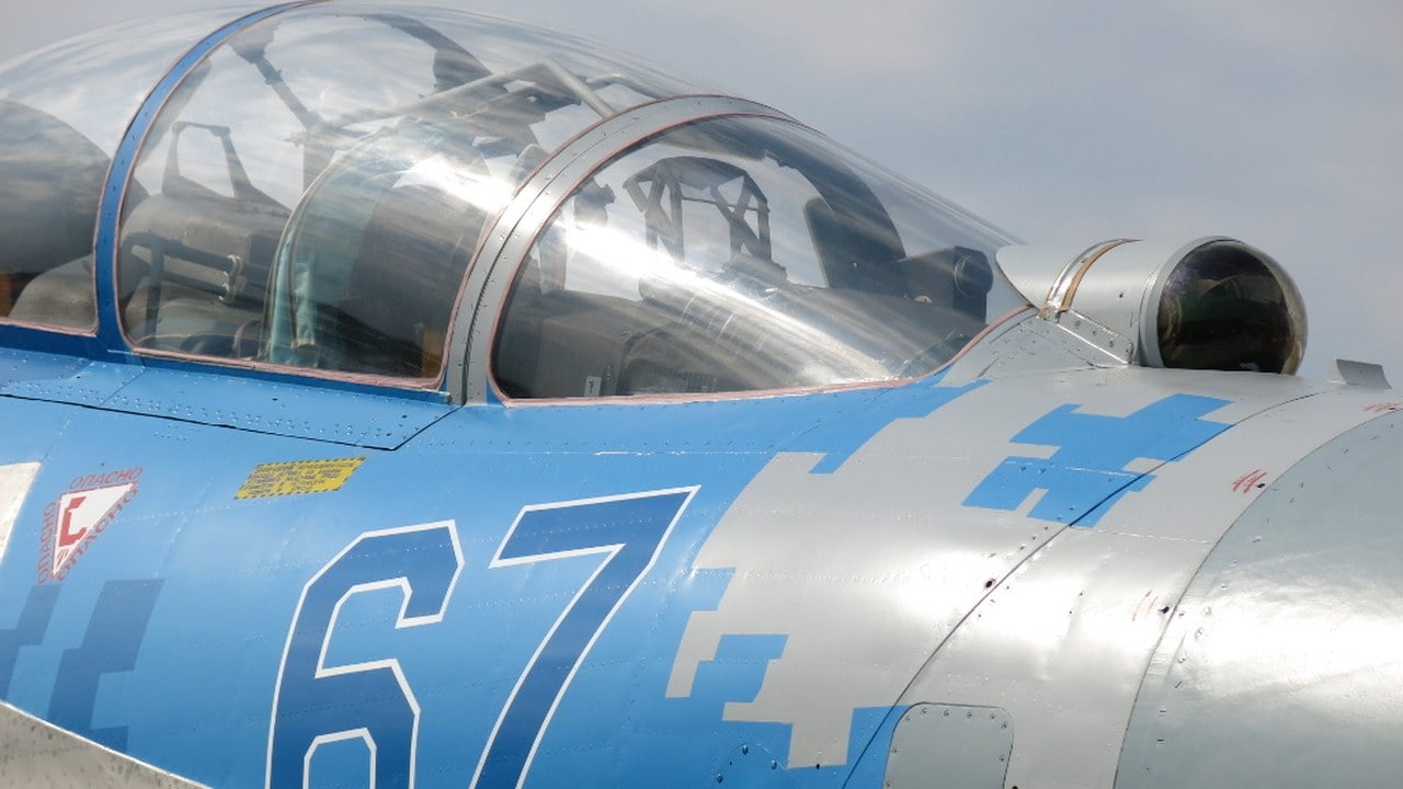 Su-27UB IRST sensor ball in front of the canopy Ukrainian Air Force Su-27UB blue 67 showing the OLS-27 infrared search and track ball ahead of the cockpit