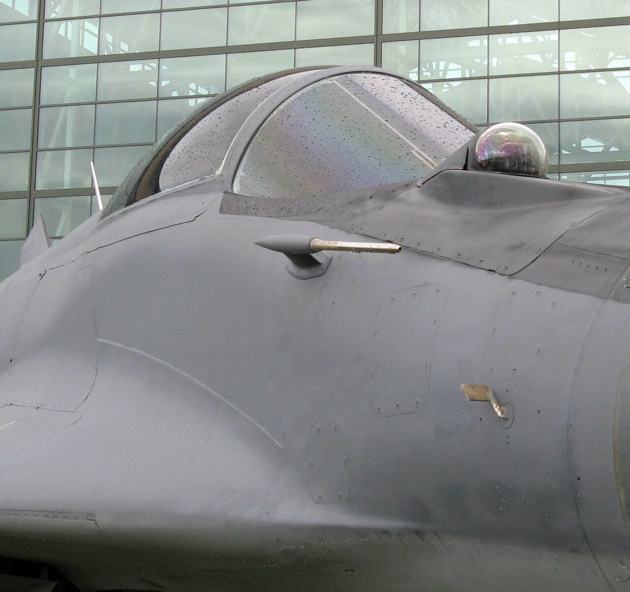 The infrared search and track sensor ball in front of the canopy of a MiG-29 Fulcrum