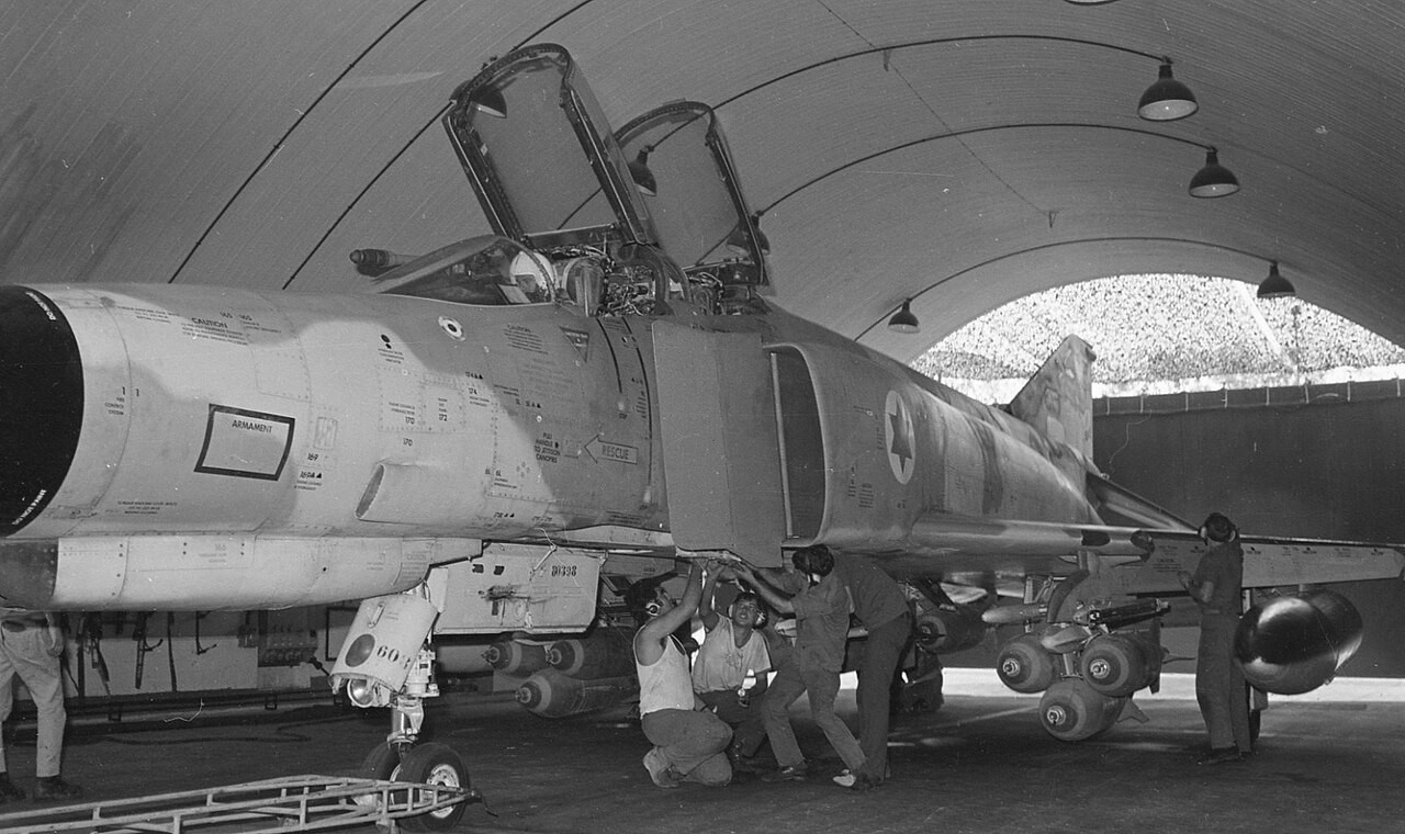 Israeli Air Force F-4E Phantom being armed with bombs in a hardened aircraft shelter, October 1973