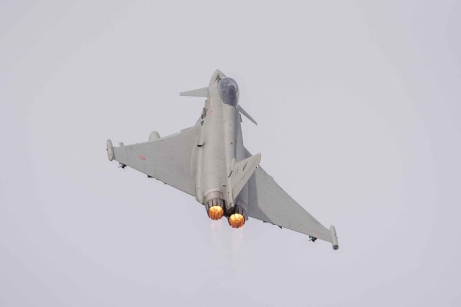 Italian Air Force Eurofighter Typhoon on a Baltic Air Policing scramble Italian Air Force Eurofighter Typhoon climbing in afterburner on a NATO Baltic Air Policing scramble