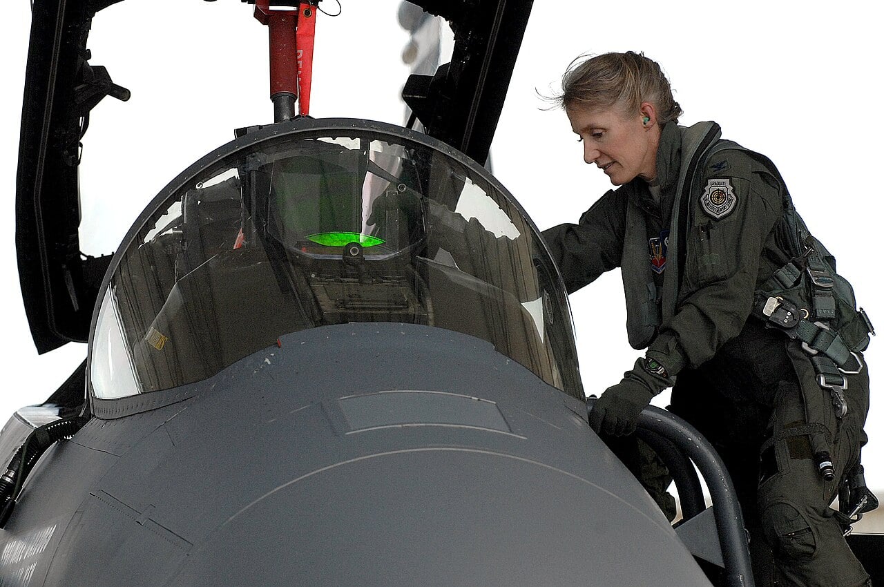 Col. Jeannie Leavitt climbs into an F-15E Strike Eagle as commander of the 4th Fighter Wing, 2013