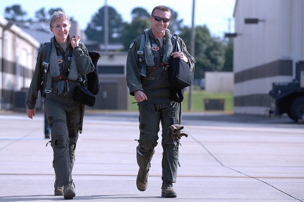 Col. Jeannie Leavitt and Capt. William Roedl walk to their F-15E during exercise Razor Talon