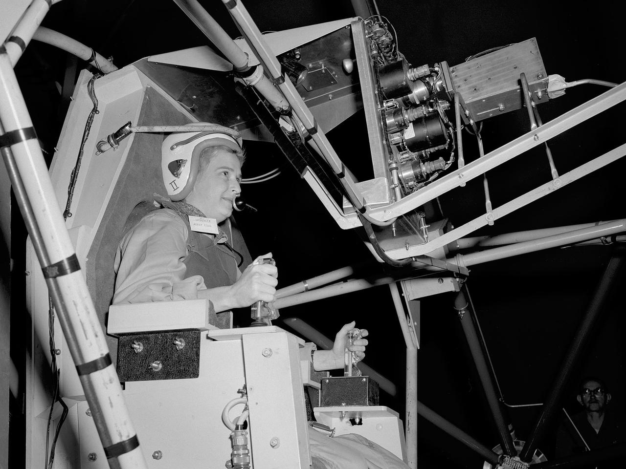 Jerrie Cobb preparing to operate the MASTIF gimbal rig at NASA Lewis in 1960