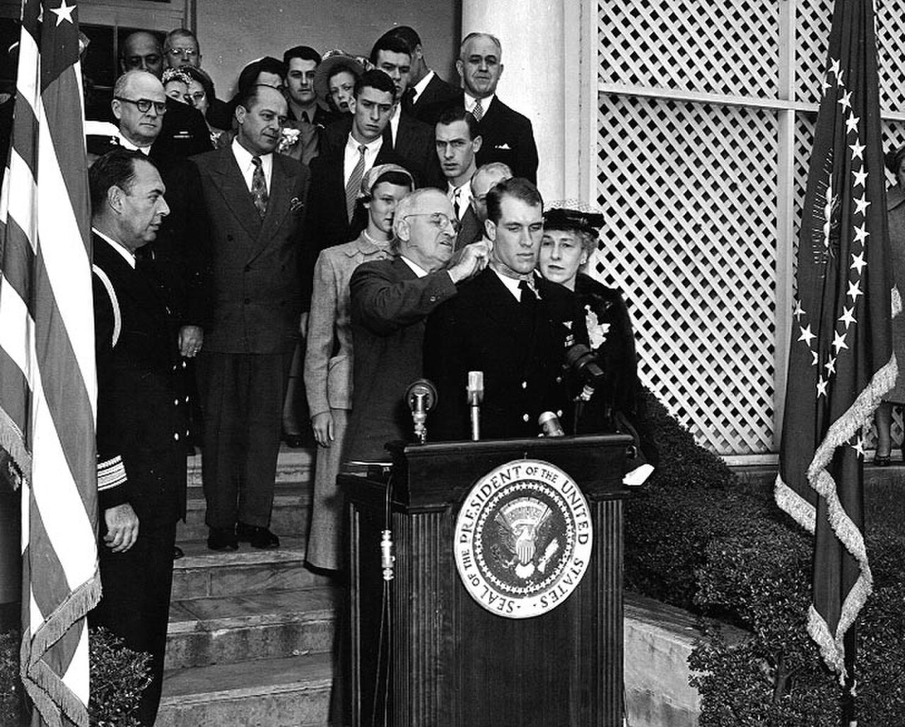 President Harry S. Truman presents the Medal of Honor to Lieutenant (junior grade) Thomas Hudner in 1951