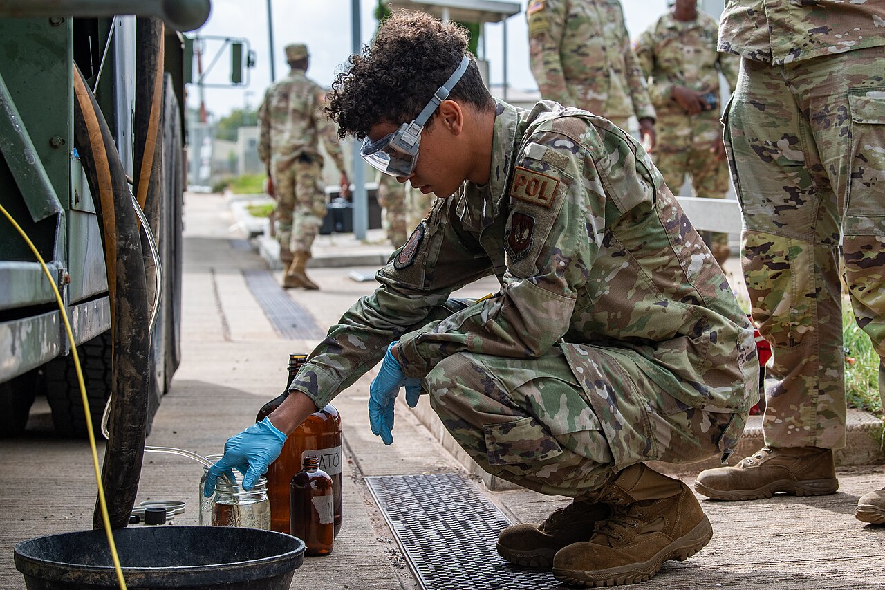 A US Air Force fuels specialist drawing a sample of JP-8 jet fuel at Spangdahlem