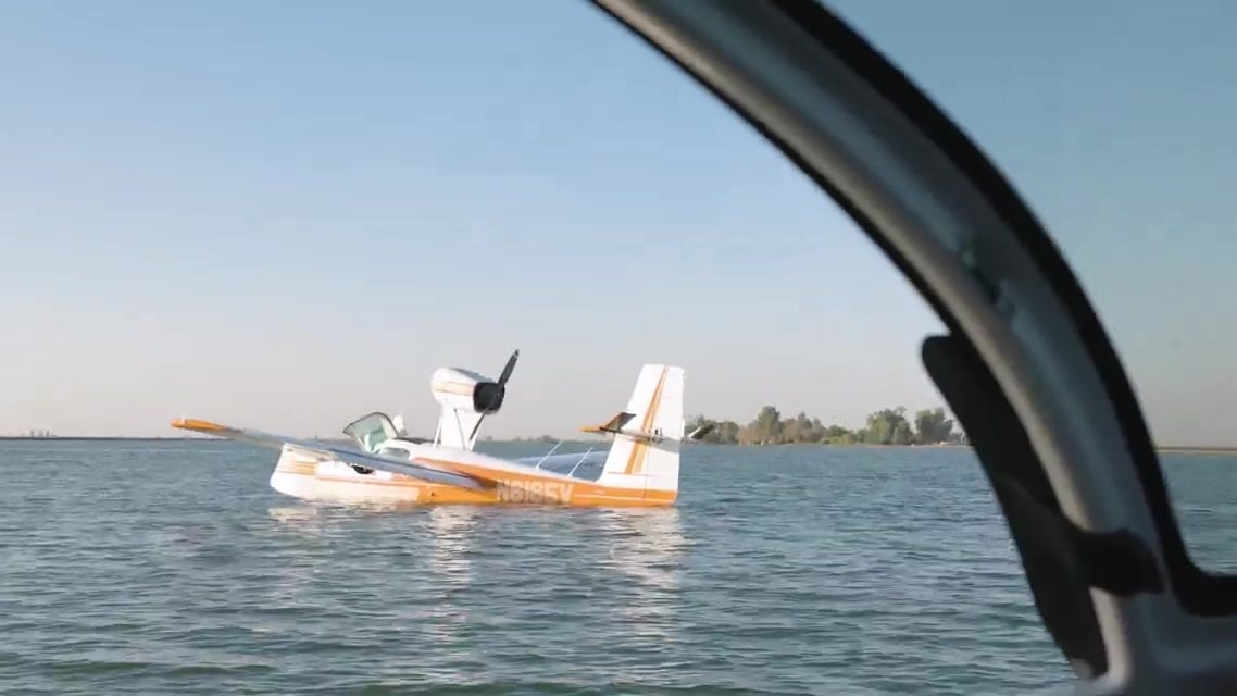 Lake Buccaneer amphibian floating on the water during a USAF Test Pilot School qualitative evaluation flight