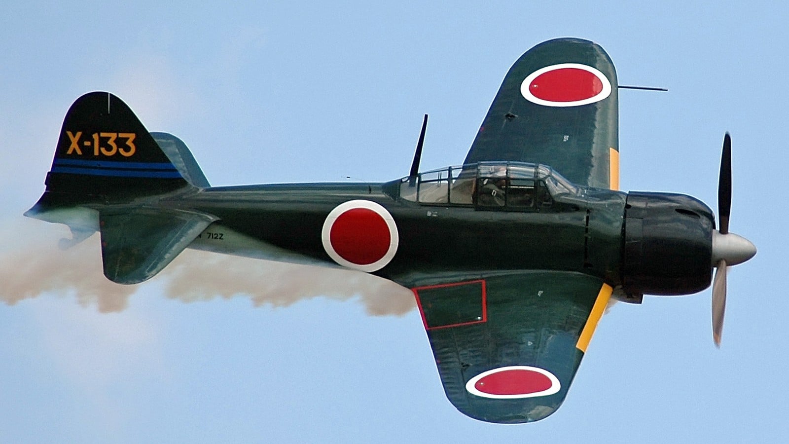 Restored Mitsubishi A6M3 Zero Model 22 flying with its landing gear retracted