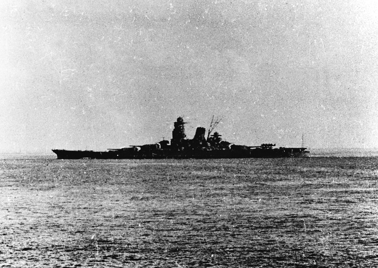 The Japanese battleship Musashi in silhouette leaving Brunei, Borneo, in 1944