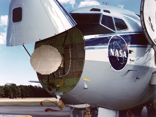 Flat-plate radar antenna inside the open nose of NASA Langley Boeing 737 research aircraft used for microburst windshear tests