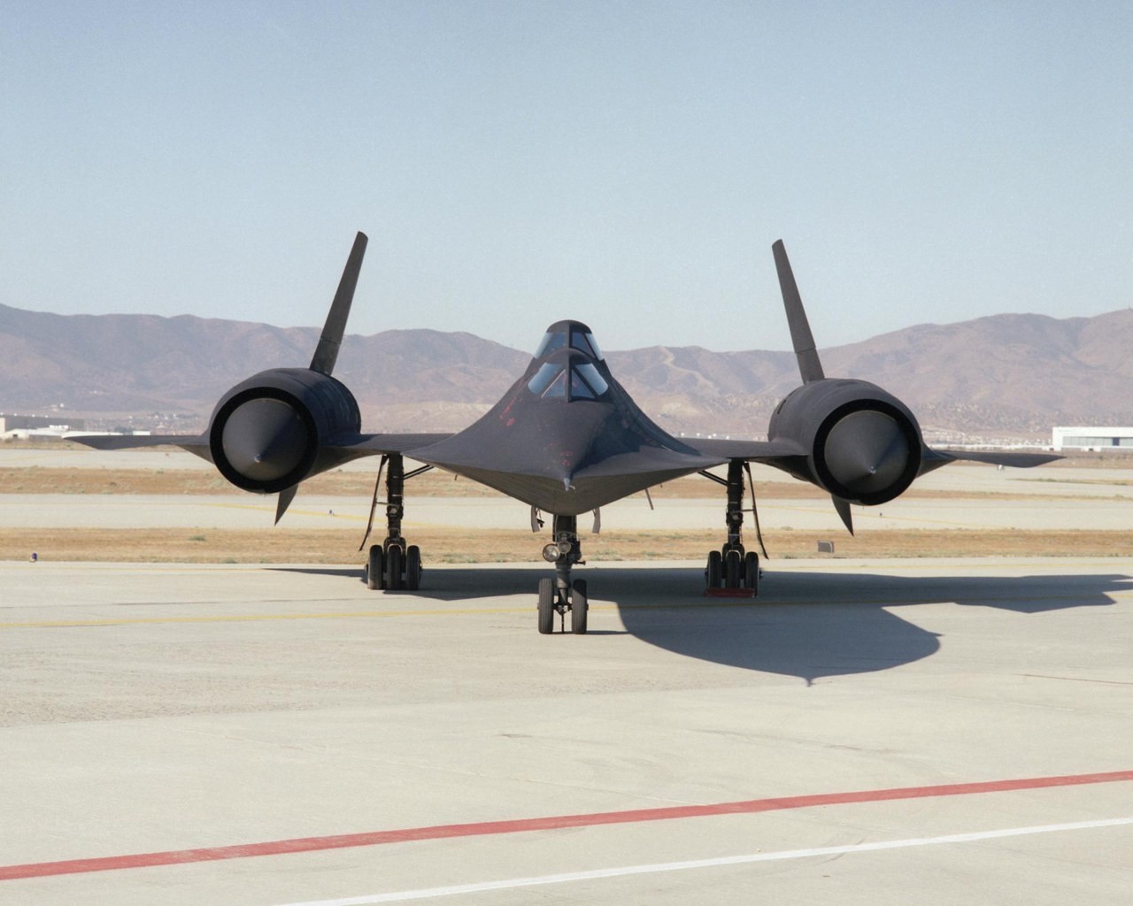 NASA SR-71B Blackbird seen head-on on the ramp at Palmdale, showing both engine inlets and their conical spikes