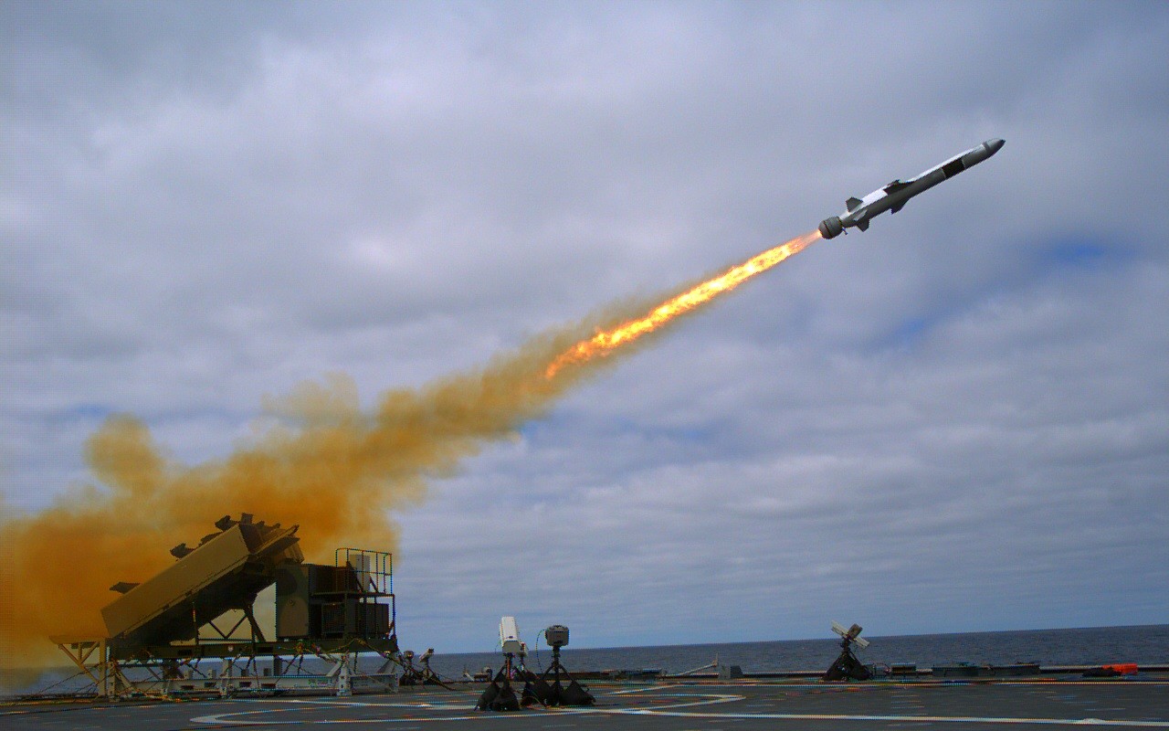 A Naval Strike Missile climbs away from a deck launcher on USS Coronado