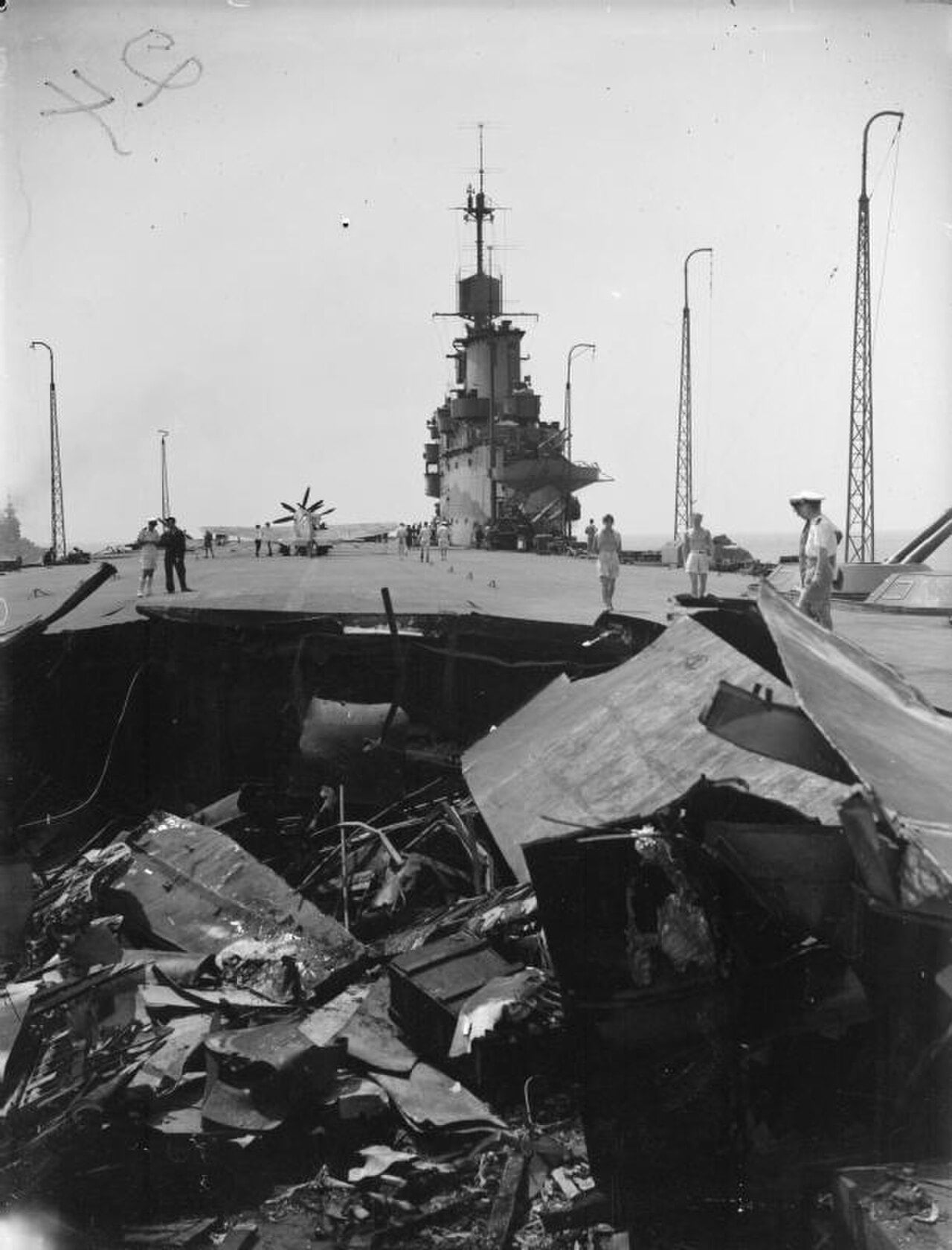 Bomb damage on the flight deck of HMS Indomitable after Ju 87 Stuka attacks on 12 August 1942