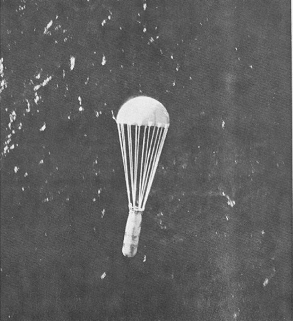 Parachute-retarded 1,000-lb Mark 26 aerial mine dropped by a 313th Bomb Wing B-29 descending toward the sea in 1945