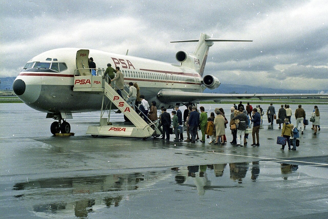Passengers queue to board a Pacific Southwest Airlines aircraft in 1971