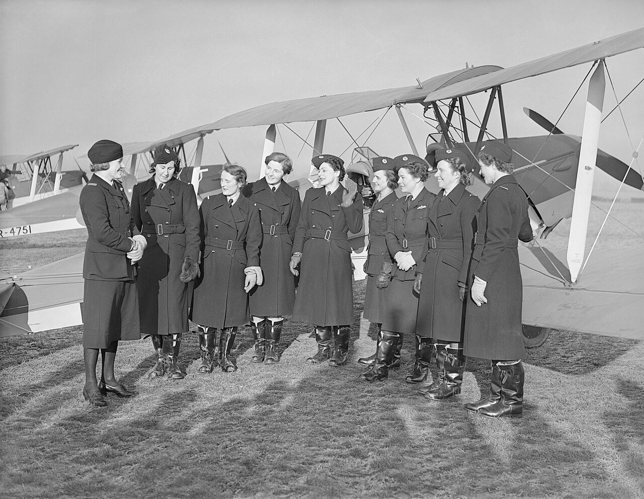 Pauline Gower and the founding women pilots of the Air Transport Auxiliary beside de Havilland Tiger Moths at Hatfield