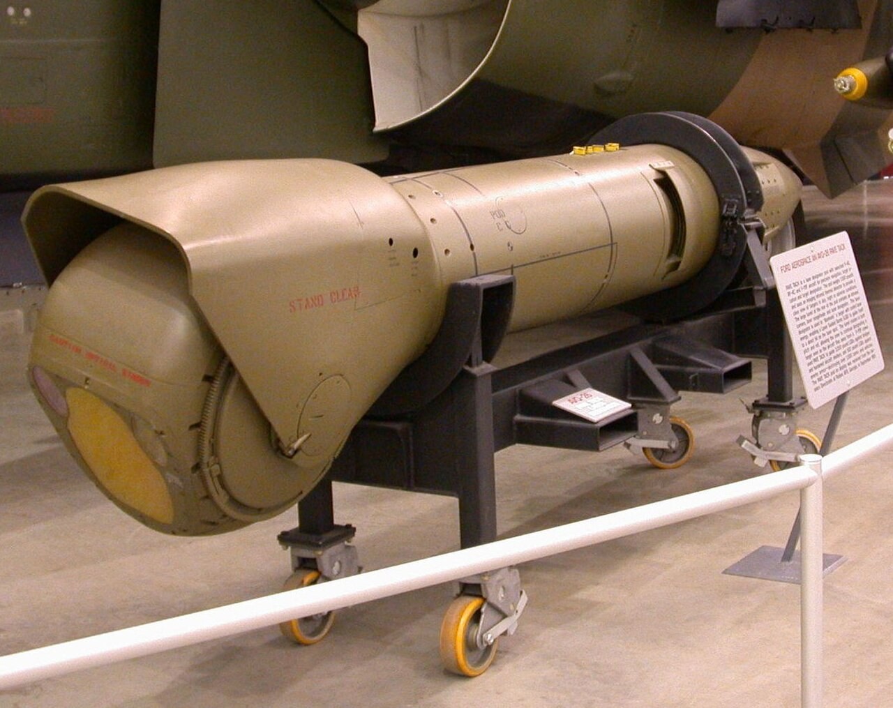 A Pave Tack AN/AVQ-26 targeting pod on display, showing its large rotating sensor turret