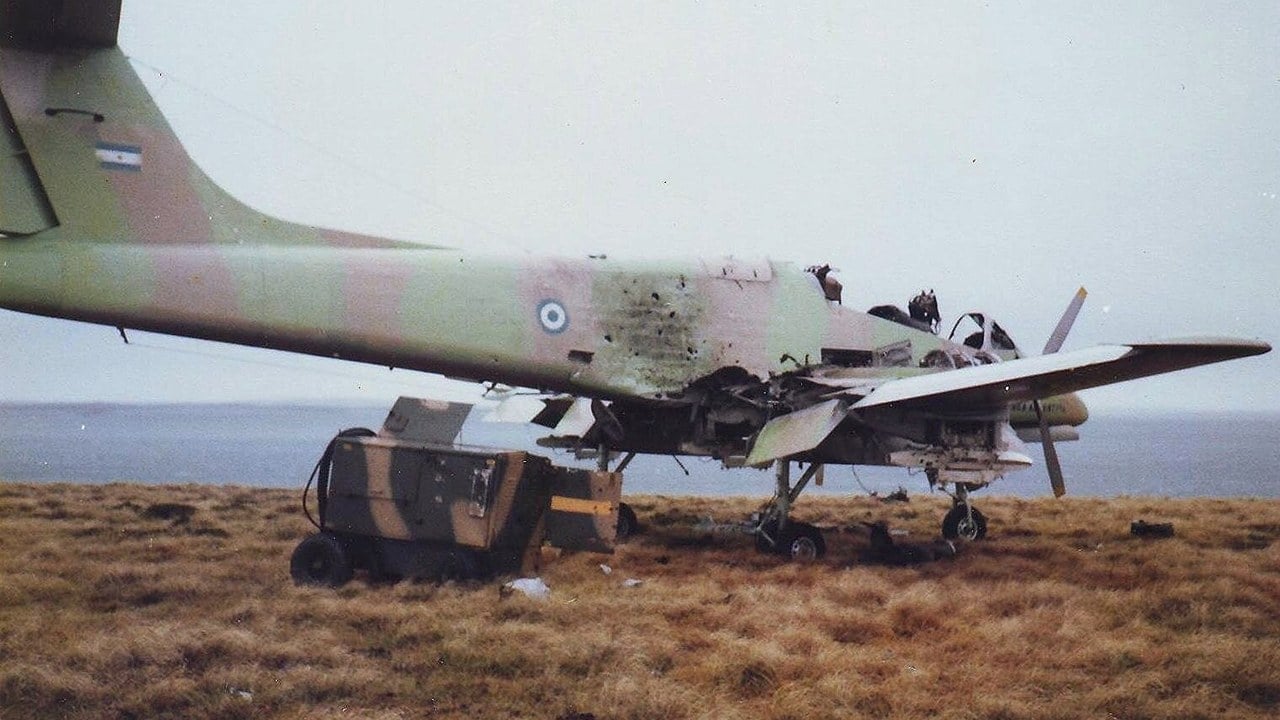 Destroyed Argentine Pucara on Pebble Island, 1982 Wrecked Argentine Air Force FMA IA 58 Pucara ground-attack aircraft on the grass airstrip at Pebble Island in the Falklands, 1982