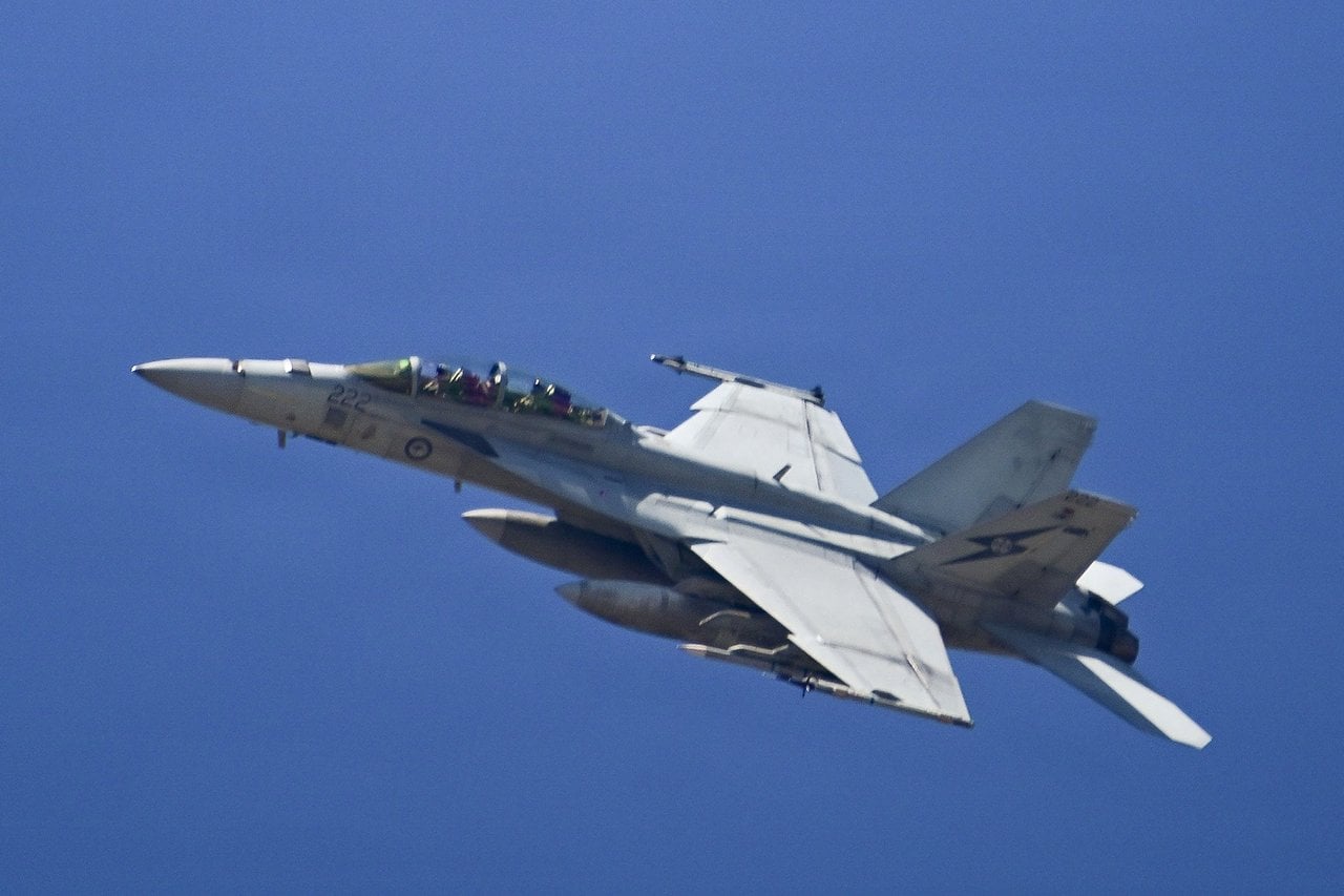 RAAF F/A-18F Super Hornet 222 banking against a blue sky near Point Mugu during Gray Flag 2026