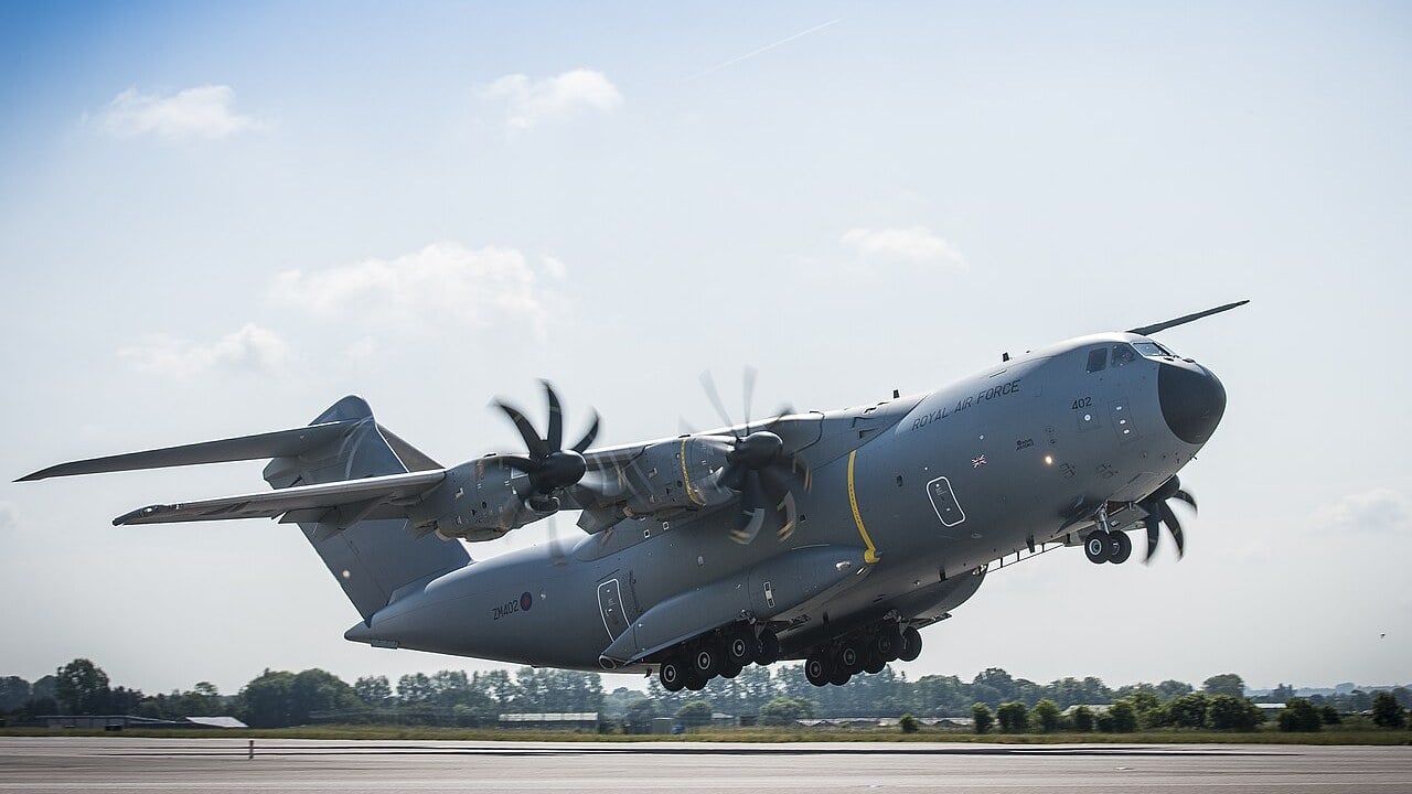 A grey Royal Air Force Airbus A400M Atlas lifting off the runway at RAF Brize Norton