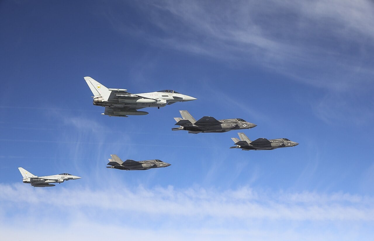 The first RAF F-35B Lightning arriving in Britain with two US F-35Bs, escorted by two RAF Eurofighter Typhoons