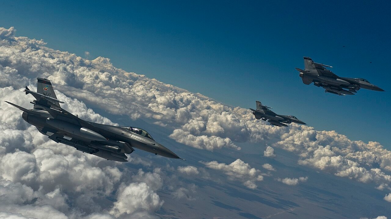 Three F-16 Fighting Falcons of the 421st Fighter Squadron over the Nevada Test and Training Range during Red Flag 12-4