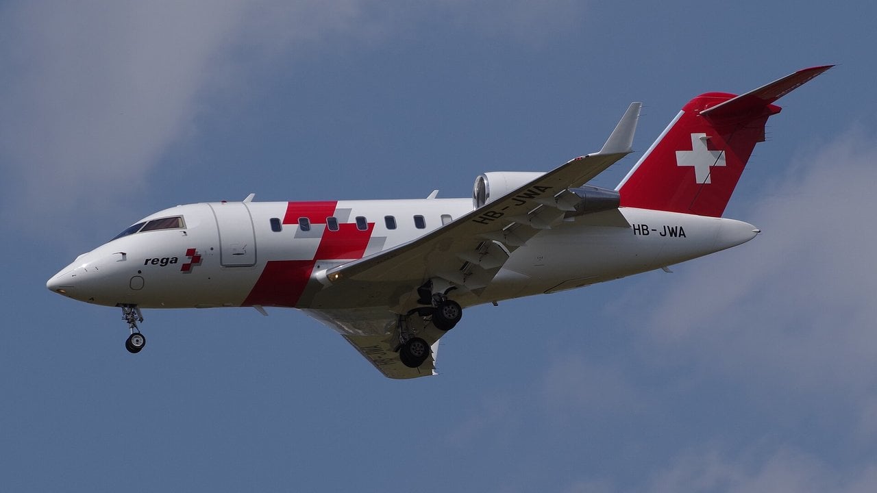 Swiss Air-Ambulance Rega Bombardier Challenger 650 HB-JWA landing at Berlin Schoenefeld in 2025