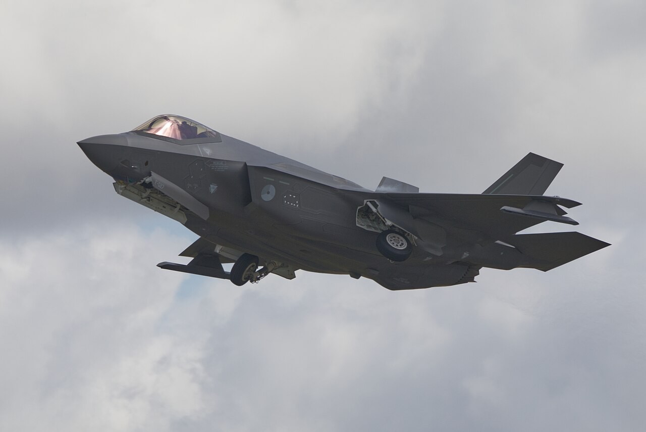 Royal Netherlands Air and Space Force F-35A F-027 in flight with landing gear down