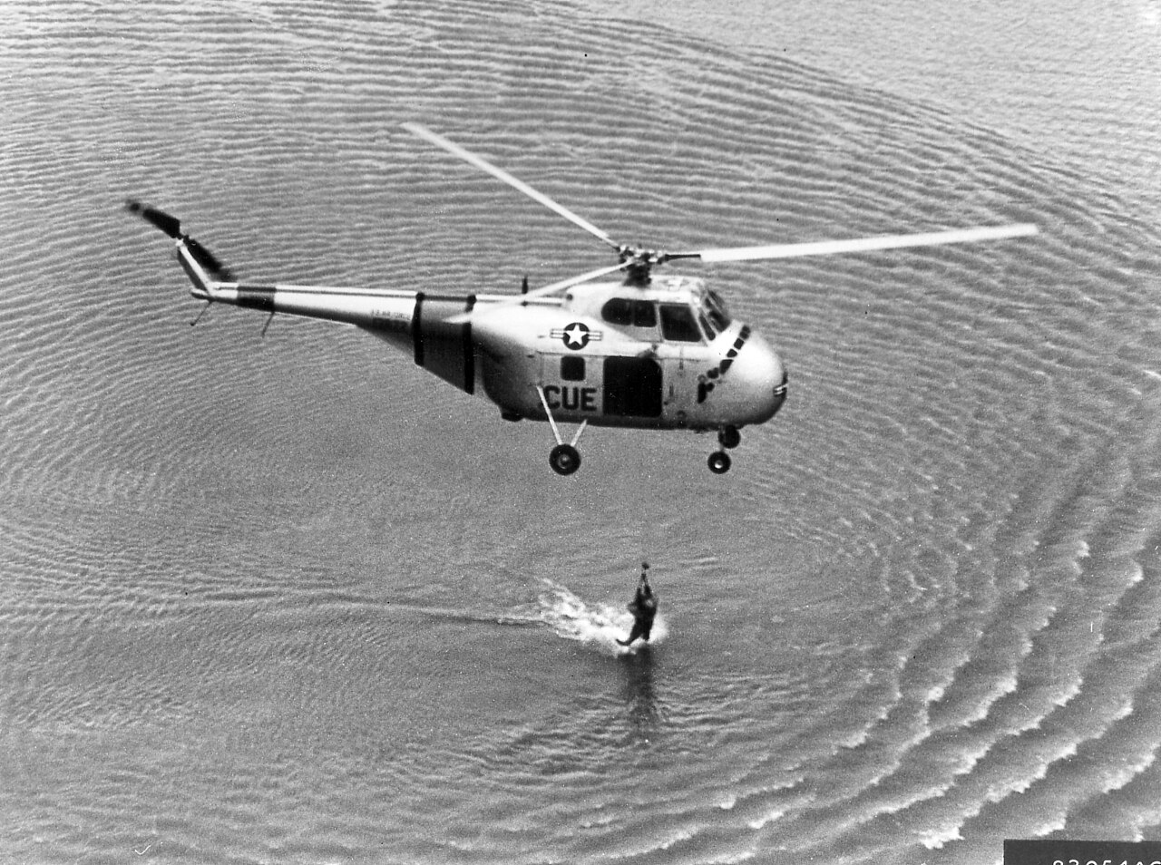 USAF SH-19B helicopter hoisting Joseph McConnell from the Yellow Sea, 12 April 1953 USAF SH-19B helicopter hoisting Joseph McConnell from the Yellow Sea, 12 April 1953