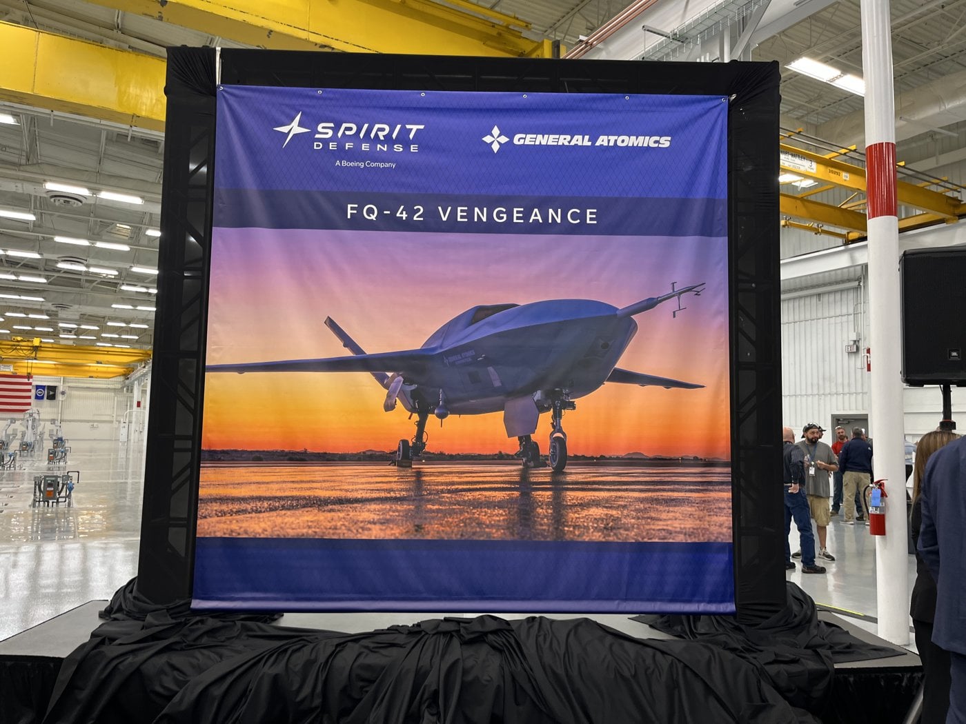 Spirit Defense and General Atomics FQ-42 Vengeance banner inside the new Spirit Defense production hall in Wichita