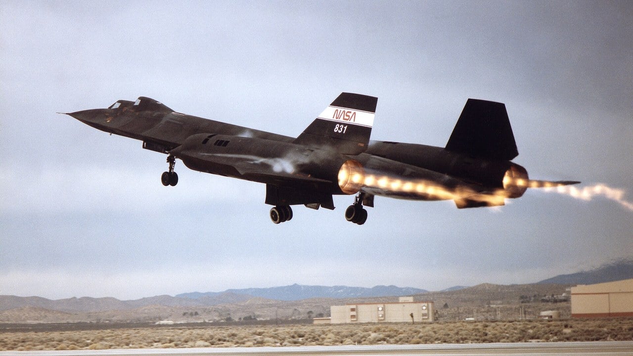NASA SR-71 take-off showing shock diamonds, 1992 NASA SR-71 Blackbird number 831 taking off in full afterburner with chains of shock diamonds glowing in both exhaust plumes