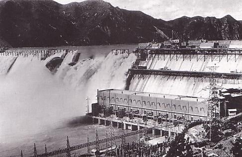 The Sui-ho Dam on the Yalu River with its power house at the base, photographed during construction in 1942