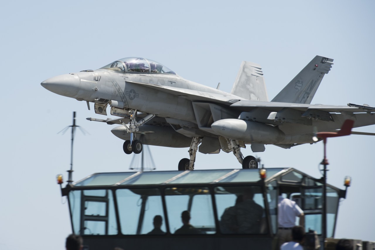 F/A-18E Super Hornet flying a touch-and-go during field carrier landing practice at Iwo To