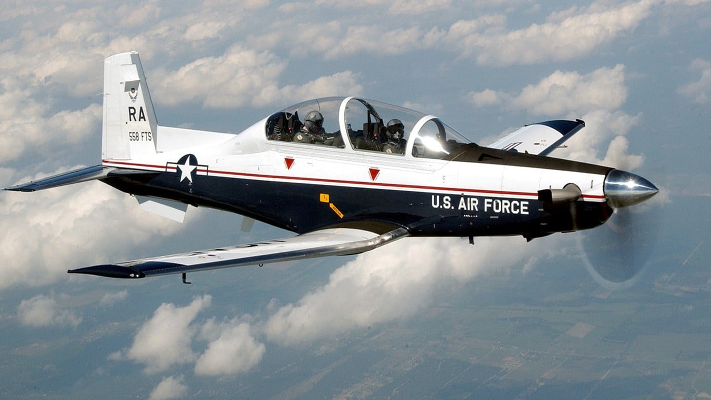 U.S. Air Force T-6A Texan II trainer from Randolph in flight above the clouds
