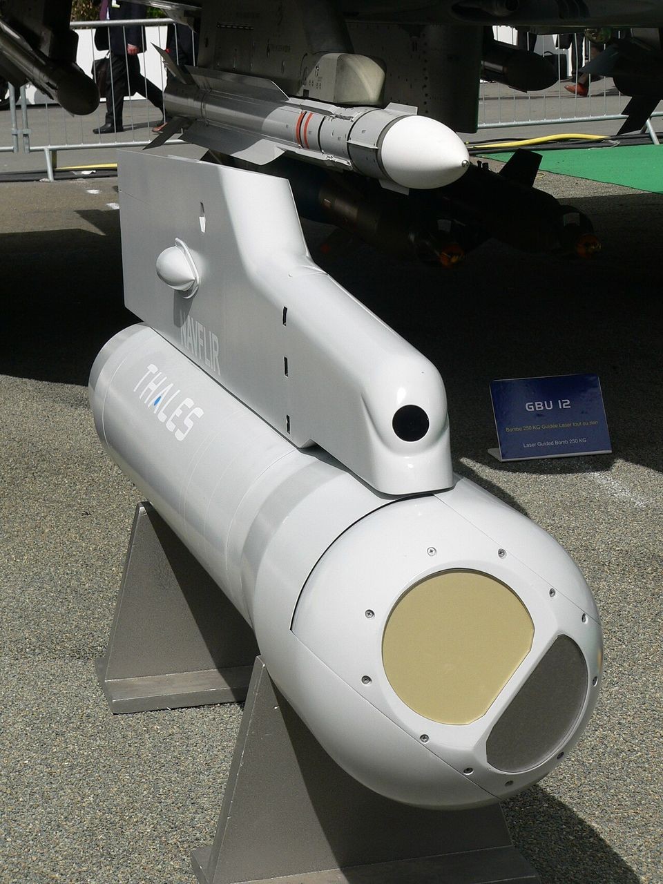 A Thales Damocles targeting pod with its separate NAVFLIR navigation sensor mounted above it, on a display stand