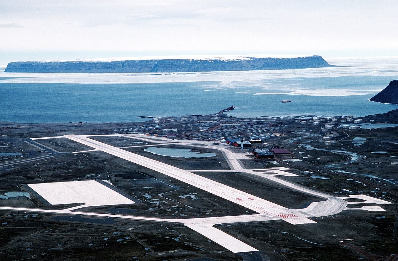 Aerial view of the runway and buildings of Thule Air Base in northwest Greenland