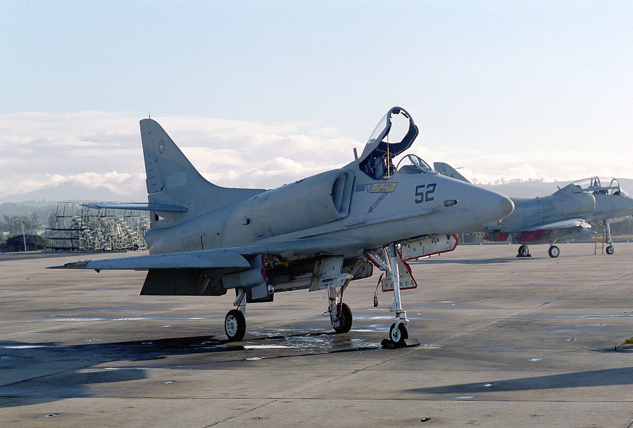 A US Navy Fighter Weapons School A-4F Skyhawk adversary jet parked at NAS Miramar in 1984