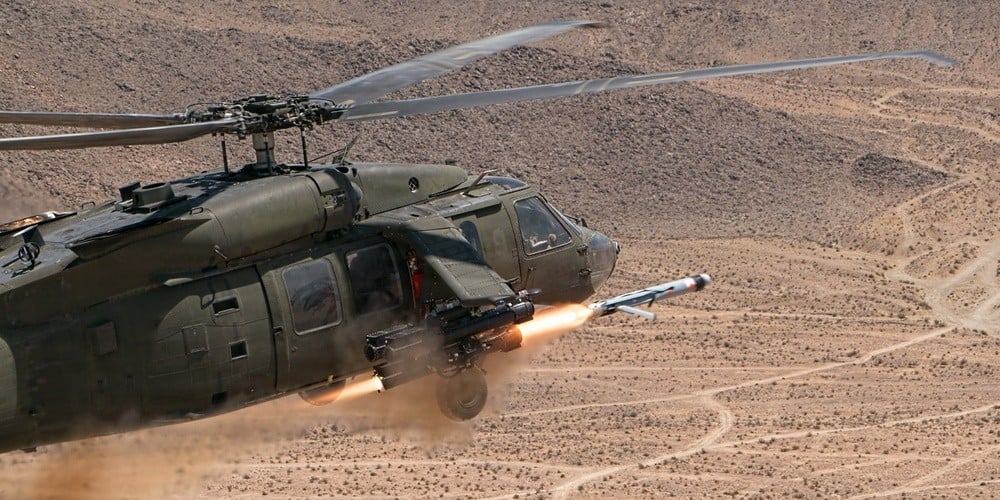 US Army UH-60M Black Hawk firing a Launched Effect-Medium Range drone over the desert at Fort Irwin