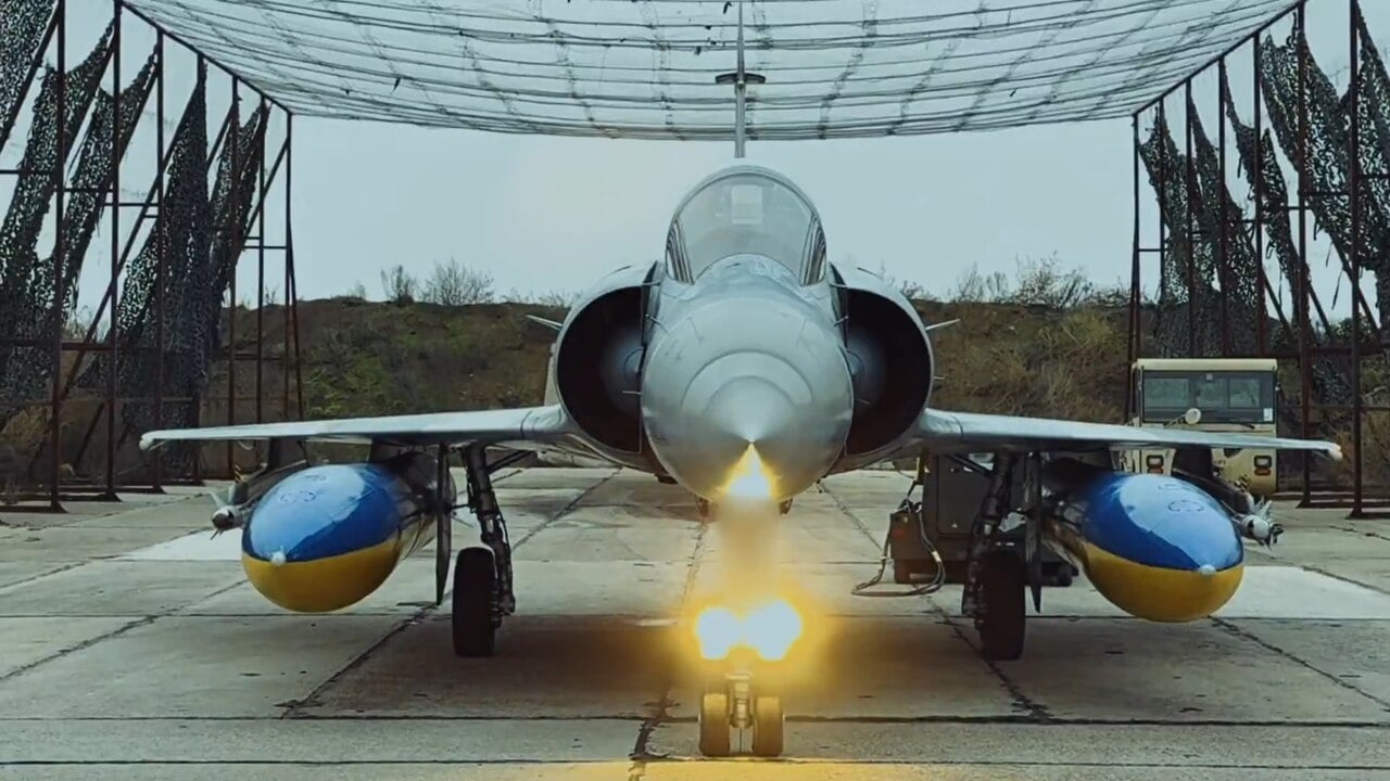 Ukrainian Air Force Mirage 2000-5F under a camouflage net shelter